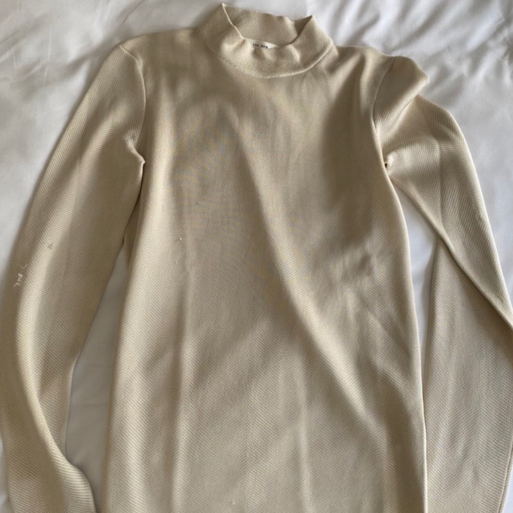 The Row 100% silk turtleneck